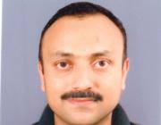 Dr. Manoj G Tharian